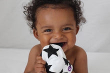 Load image into Gallery viewer, gummee glove teething mitten for babies teething ring set with silicone baby teether Black and White in use