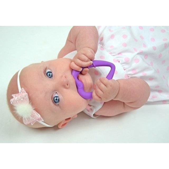 silicone heart teething ring for young teethers in use