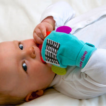 Load image into Gallery viewer, A baby enjoying chewing on the side teethers on our Gummee Glove