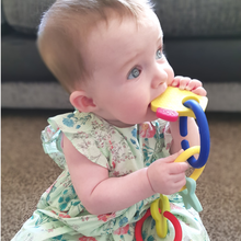 Load image into Gallery viewer, teething toy with silicone teether links baby teething in use